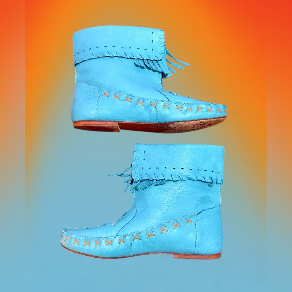 VINTAGE 1980’s — leather fringed moccasin boots in vibrant turquoise